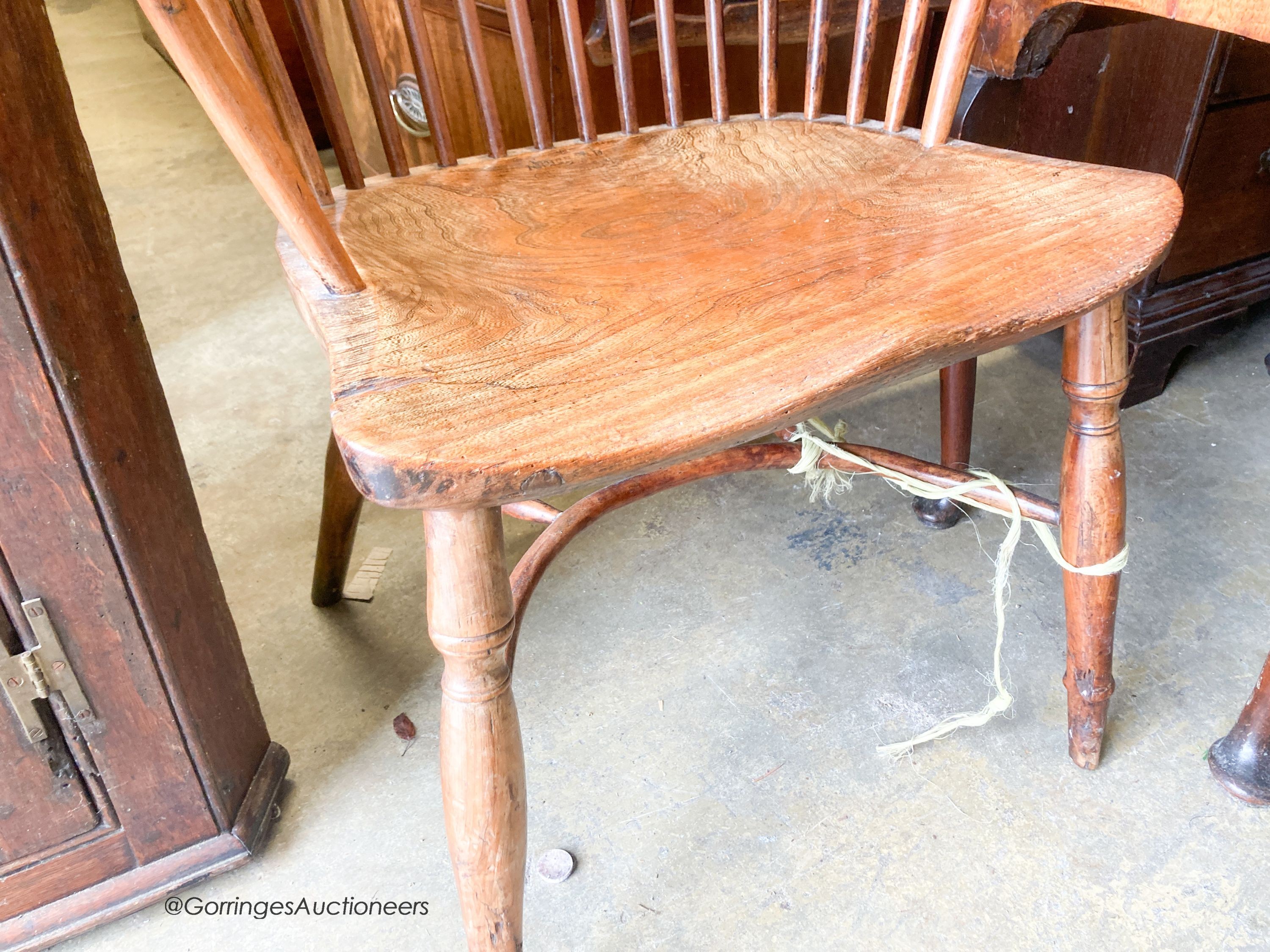 An early 19th century yew and elm Windsor elbow chair, width 59cm, depth 40cm, height 97cm